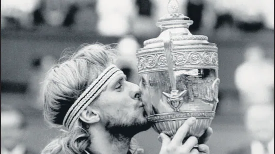 Bjorn-Borg-kisses-the-Gentlemen-s-Singles-Trophy-a_1752259534519
